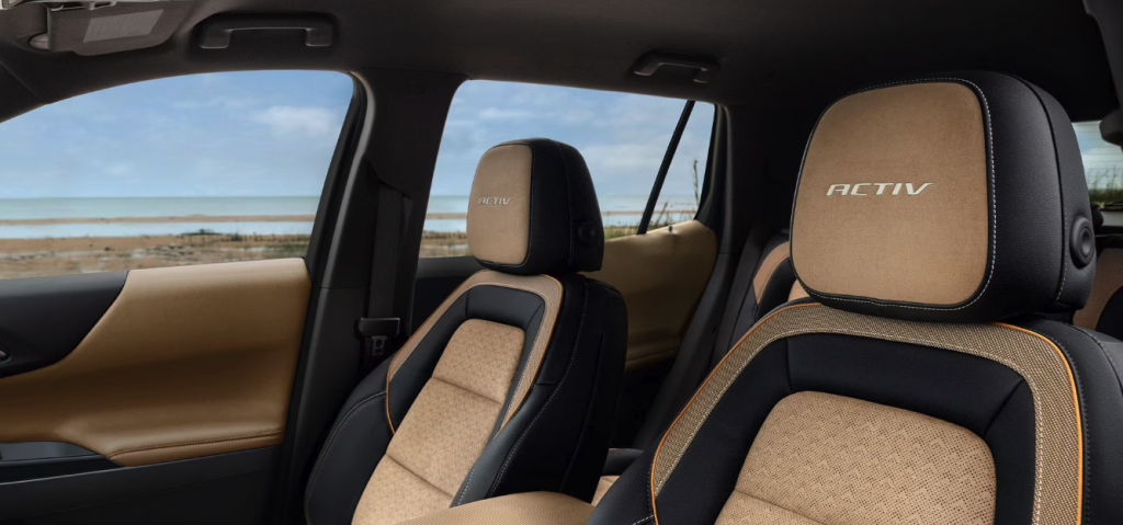 The 2026 Chevrolet Equinox ACTIV front bucket seats in Black and Maple sugar with sueded microfiber